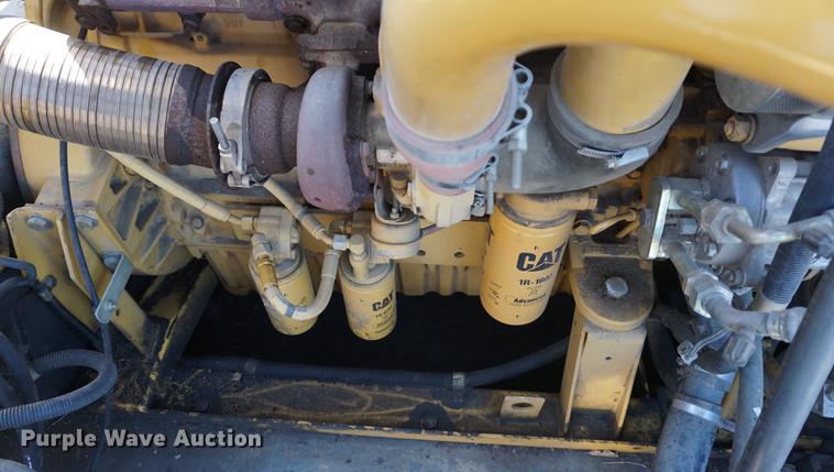 image for item DE3091 1998 Caterpillar Lexion 465 RWA combine