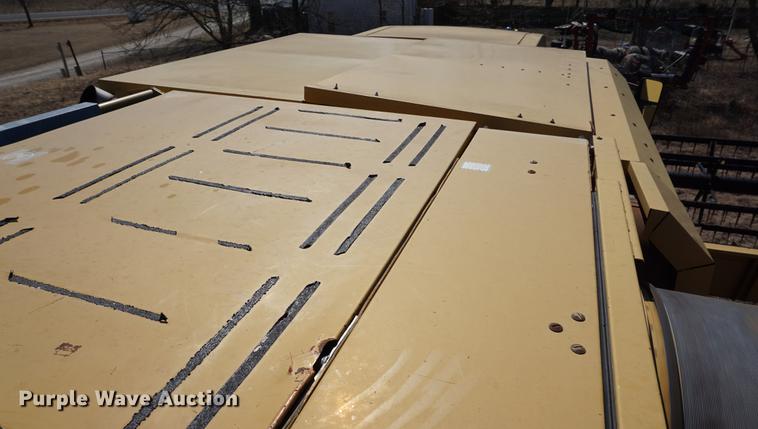 image for item DE3091 1998 Caterpillar Lexion 465 RWA combine