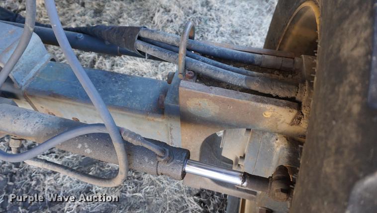 image for item DE3091 1998 Caterpillar Lexion 465 RWA combine