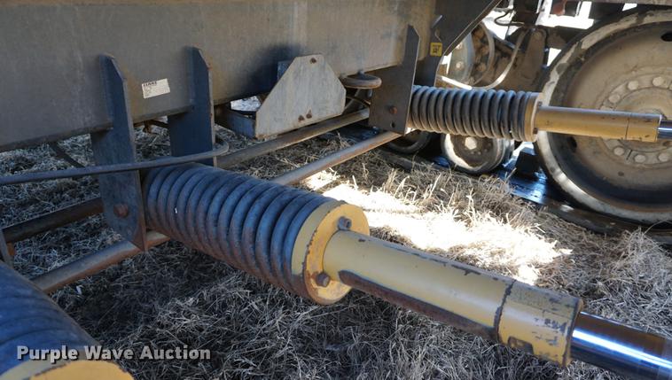 image for item DE3091 1998 Caterpillar Lexion 465 RWA combine