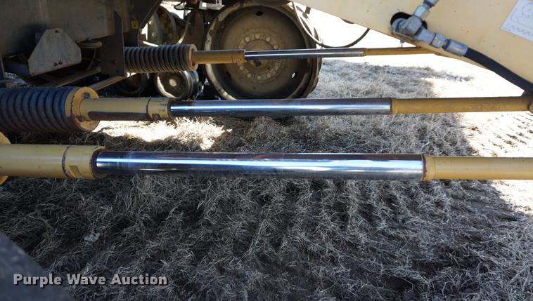 image for item DE3091 1998 Caterpillar Lexion 465 RWA combine