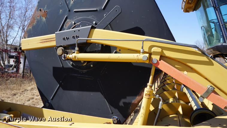 image for item DE3091 1998 Caterpillar Lexion 465 RWA combine