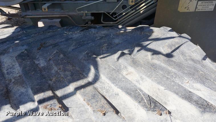 image for item DE3091 1998 Caterpillar Lexion 465 RWA combine