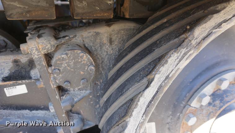 image for item DE3091 1998 Caterpillar Lexion 465 RWA combine