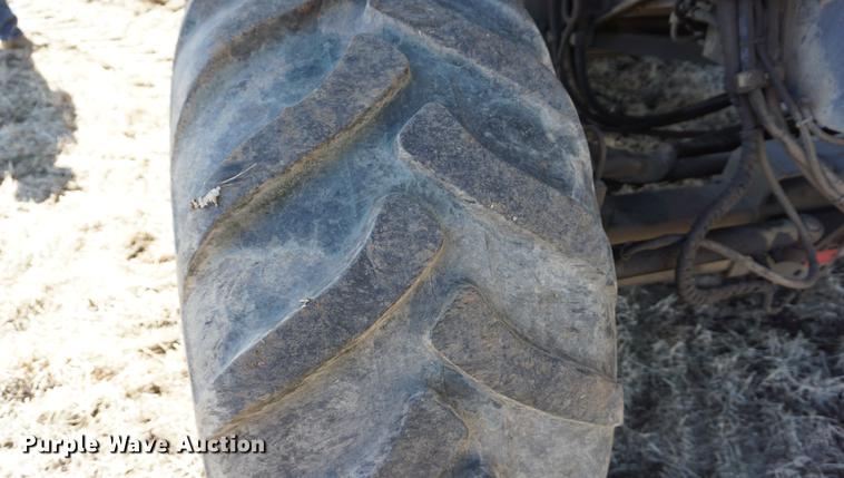 image for item DE3091 1998 Caterpillar Lexion 465 RWA combine