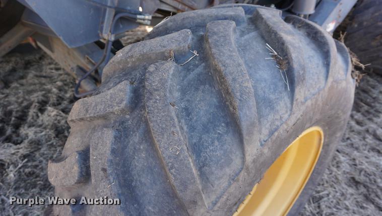 image for item DE3091 1998 Caterpillar Lexion 465 RWA combine