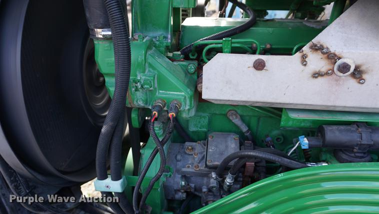 image for item DE3127 2003 John Deere 7320 MFWD tractor