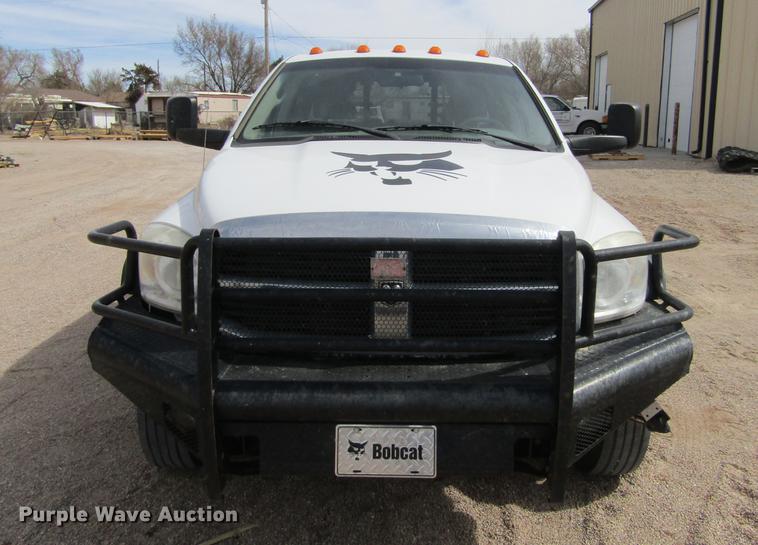 image for item DE6656 2008 Dodge Ram 5500HD SLT Quad Cab flatbed pickup truck