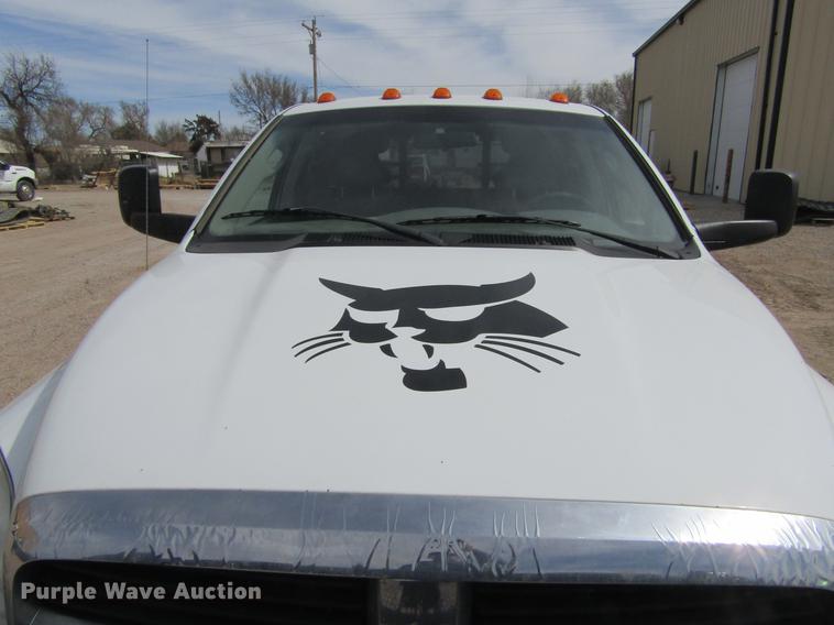 image for item DE6656 2008 Dodge Ram 5500HD SLT Quad Cab flatbed pickup truck