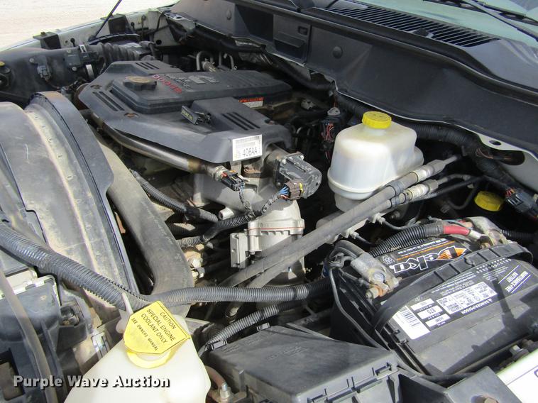 image for item DE6656 2008 Dodge Ram 5500HD SLT Quad Cab flatbed pickup truck