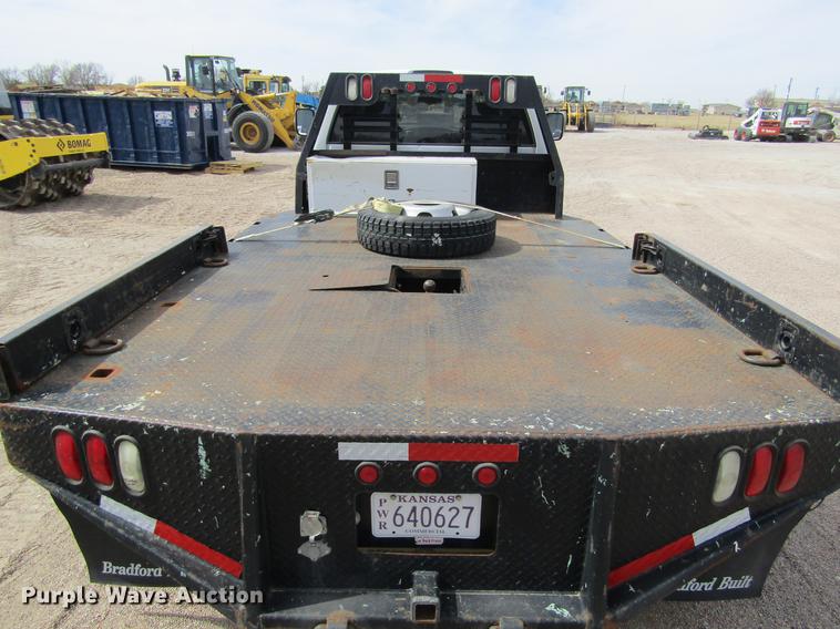 image for item DE6656 2008 Dodge Ram 5500HD SLT Quad Cab flatbed pickup truck