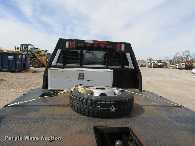 image for item DE6656 2008 Dodge Ram 5500HD SLT Quad Cab flatbed pickup truck