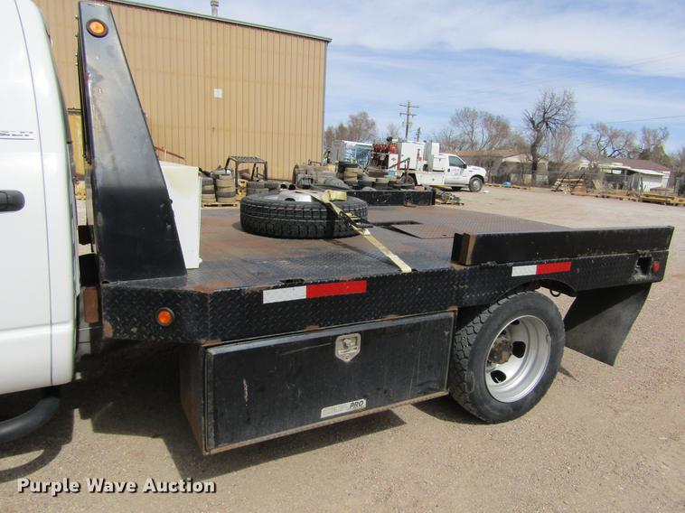 image for item DE6656 2008 Dodge Ram 5500HD SLT Quad Cab flatbed pickup truck