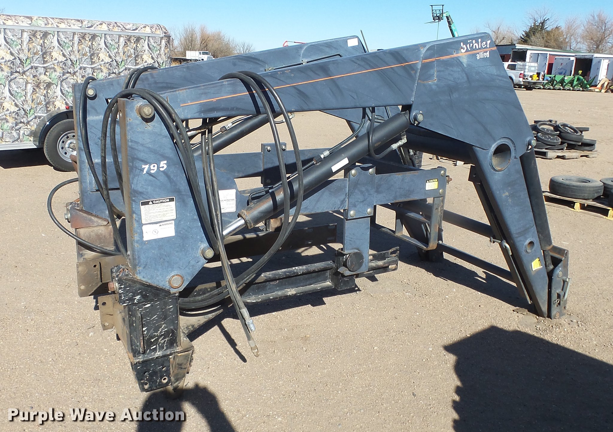 Buhler 795 loader in Kinsley, KS Item EA9839 sold Purple Wave