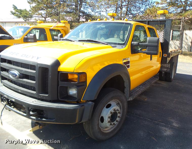 image for item DC4417 2008 Ford F550 Crew Cab flatbed dump truck