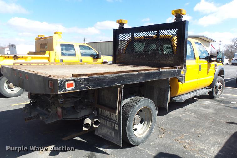 image for item DC4417 2008 Ford F550 Crew Cab flatbed dump truck