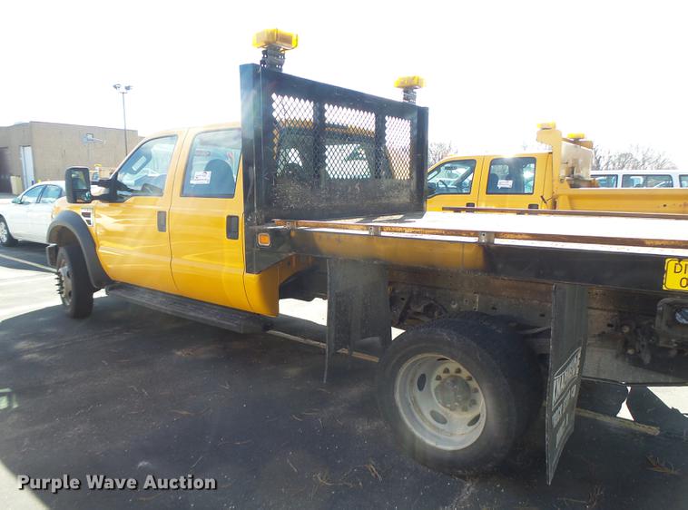image for item DC4417 2008 Ford F550 Crew Cab flatbed dump truck