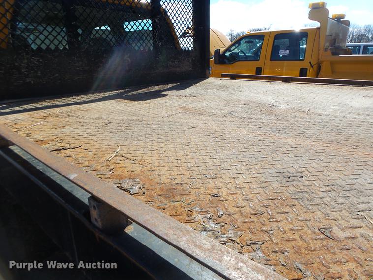 image for item DC4417 2008 Ford F550 Crew Cab flatbed dump truck