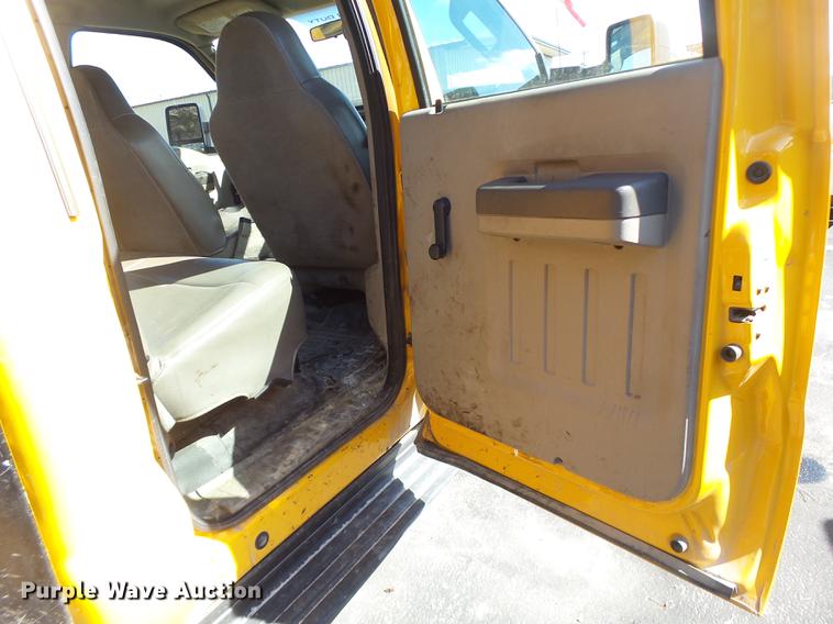 image for item DC4417 2008 Ford F550 Crew Cab flatbed dump truck