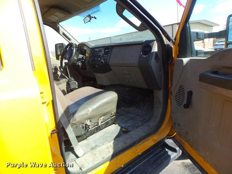 image for item DC4417 2008 Ford F550 Crew Cab flatbed dump truck