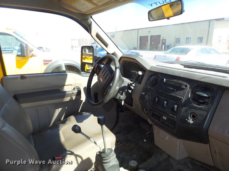 image for item DC4417 2008 Ford F550 Crew Cab flatbed dump truck