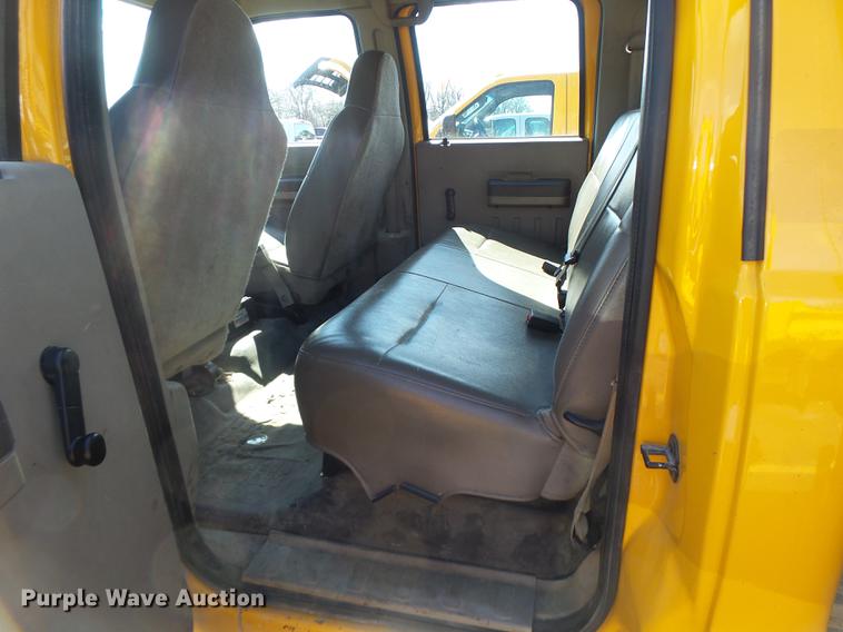 image for item DC4417 2008 Ford F550 Crew Cab flatbed dump truck