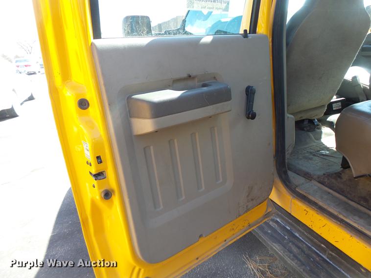 image for item DC4417 2008 Ford F550 Crew Cab flatbed dump truck