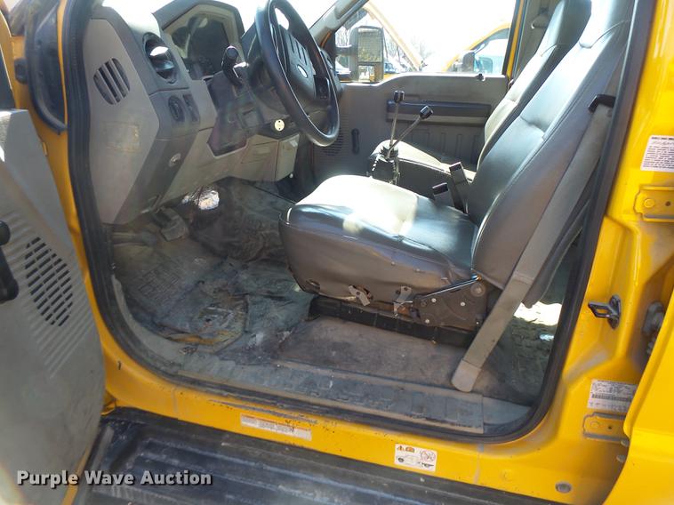 image for item DC4417 2008 Ford F550 Crew Cab flatbed dump truck