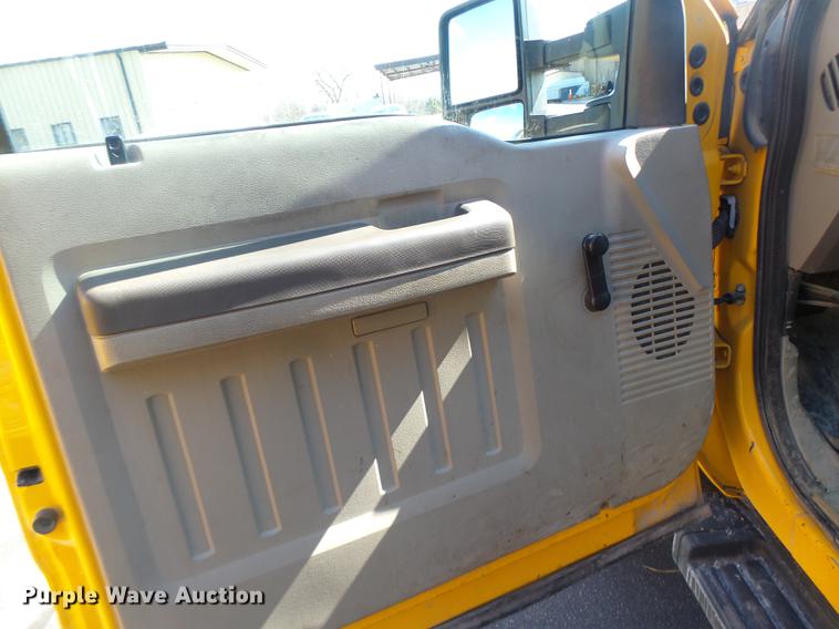 image for item DC4417 2008 Ford F550 Crew Cab flatbed dump truck