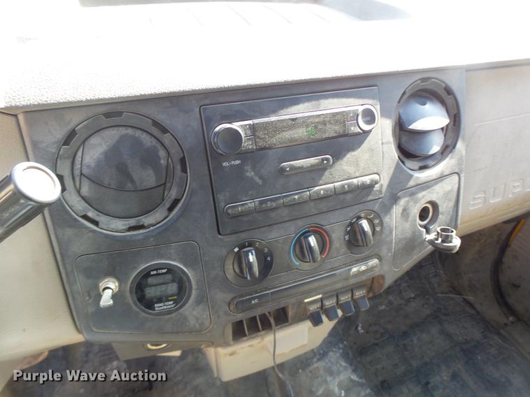 image for item DC4417 2008 Ford F550 Crew Cab flatbed dump truck