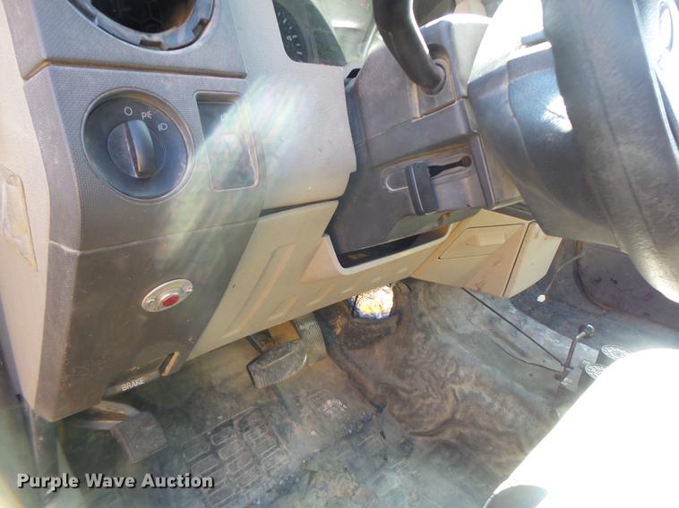 image for item DC4417 2008 Ford F550 Crew Cab flatbed dump truck