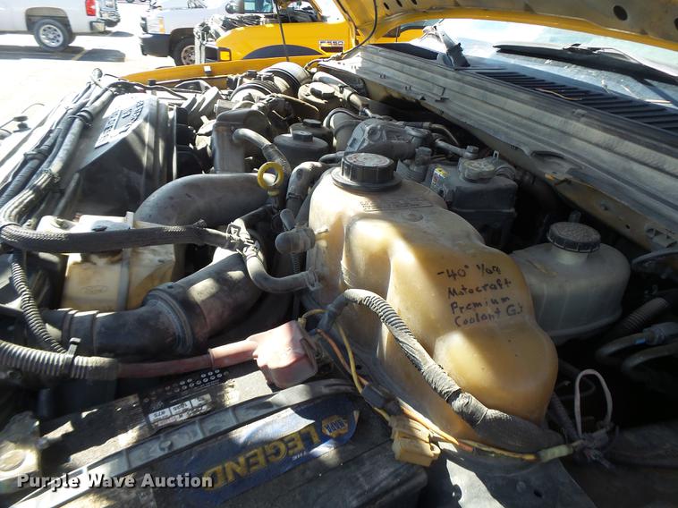 image for item DC4417 2008 Ford F550 Crew Cab flatbed dump truck