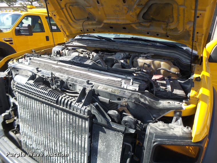 image for item DC4417 2008 Ford F550 Crew Cab flatbed dump truck