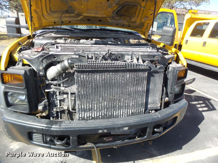 image for item DC4417 2008 Ford F550 Crew Cab flatbed dump truck