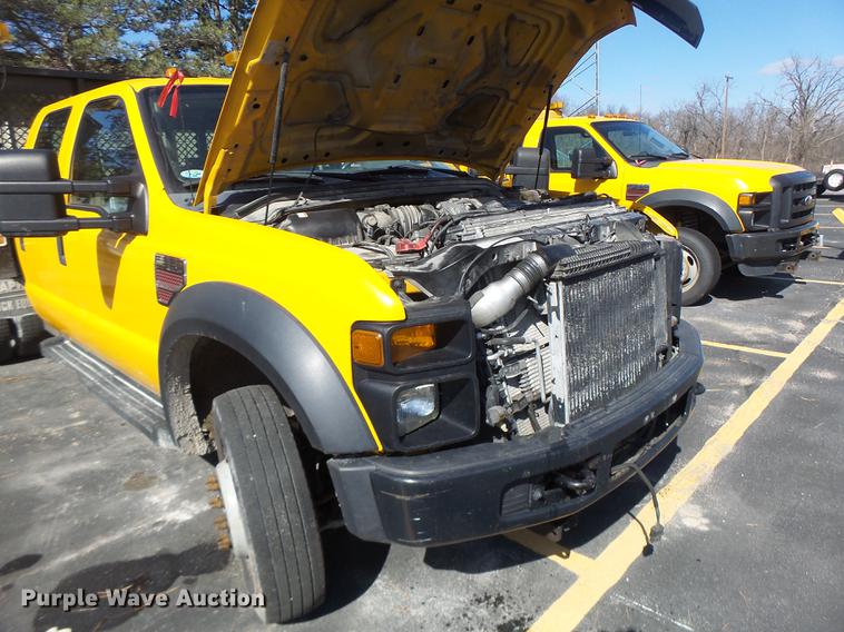 image for item DC4417 2008 Ford F550 Crew Cab flatbed dump truck