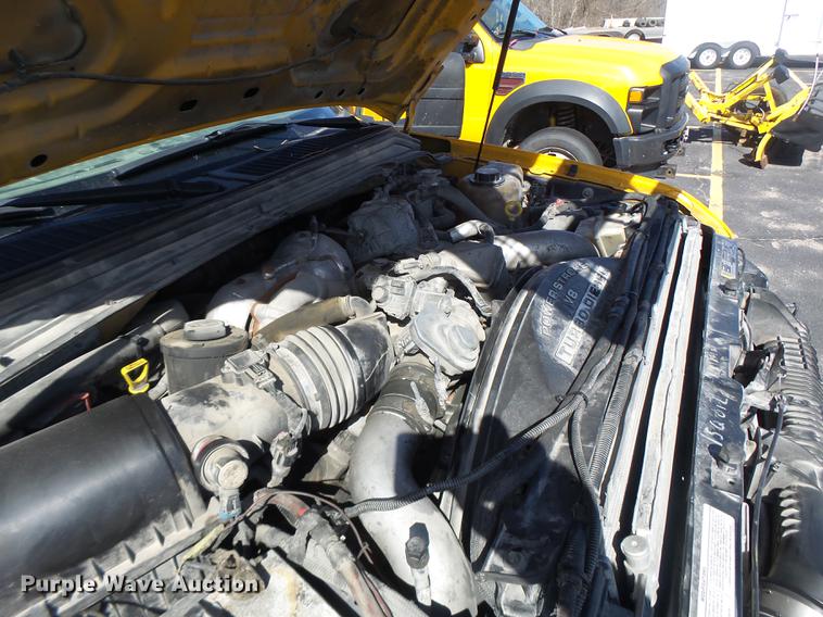 image for item DC4417 2008 Ford F550 Crew Cab flatbed dump truck