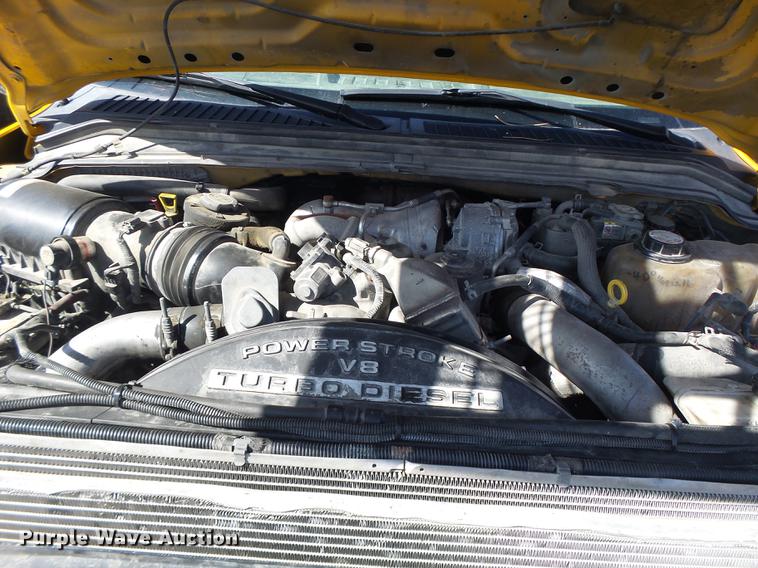 image for item DC4417 2008 Ford F550 Crew Cab flatbed dump truck