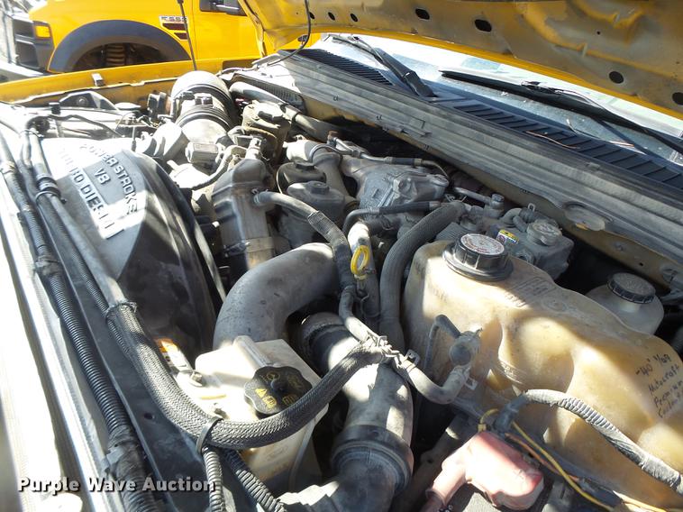 image for item DC4417 2008 Ford F550 Crew Cab flatbed dump truck