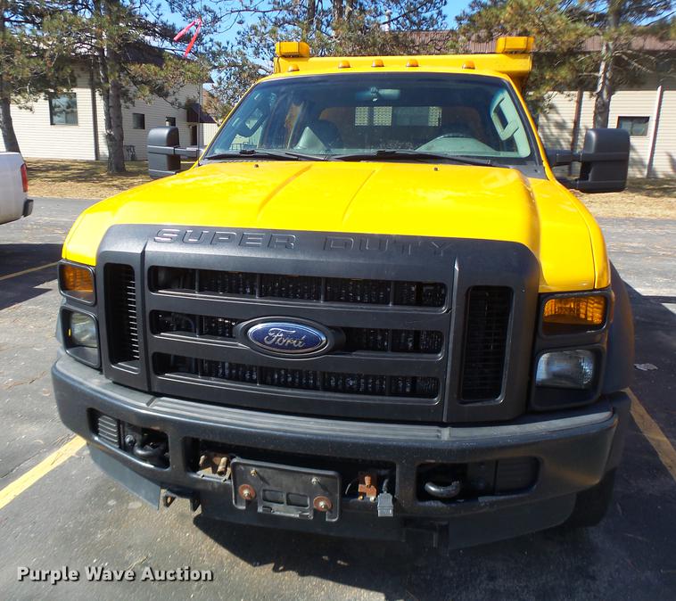 image for item DC4418 2008 Ford F550 Crew Cab flatbed dump truck