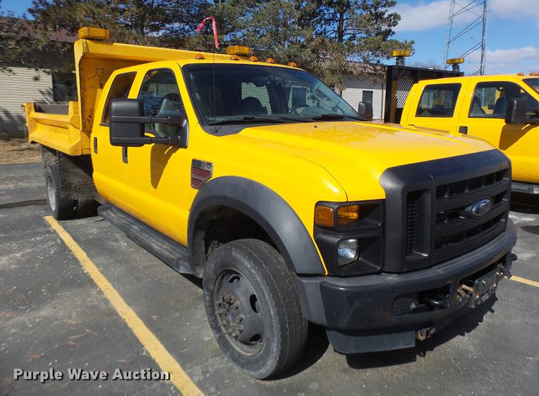 image for item DC4418 2008 Ford F550 Crew Cab flatbed dump truck