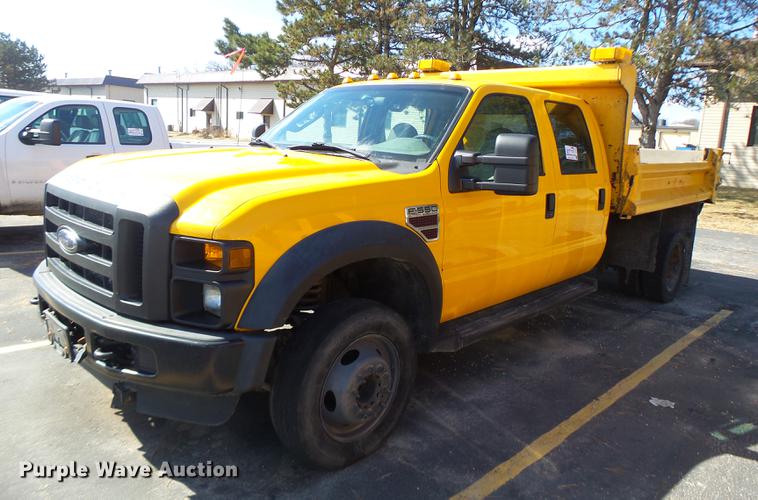 image for item DC4418 2008 Ford F550 Crew Cab flatbed dump truck
