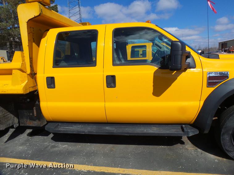 image for item DC4418 2008 Ford F550 Crew Cab flatbed dump truck