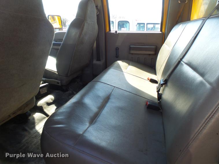 image for item DC4418 2008 Ford F550 Crew Cab flatbed dump truck