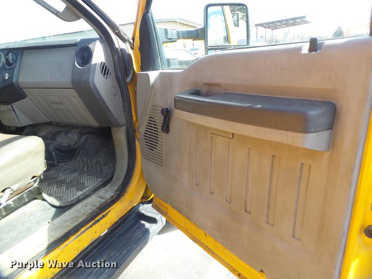 image for item DC4418 2008 Ford F550 Crew Cab flatbed dump truck