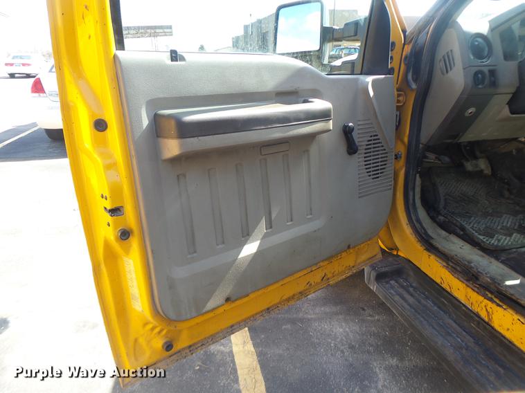 image for item DC4418 2008 Ford F550 Crew Cab flatbed dump truck