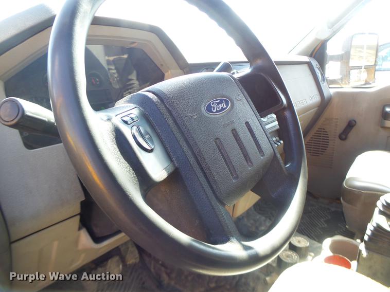 image for item DC4418 2008 Ford F550 Crew Cab flatbed dump truck