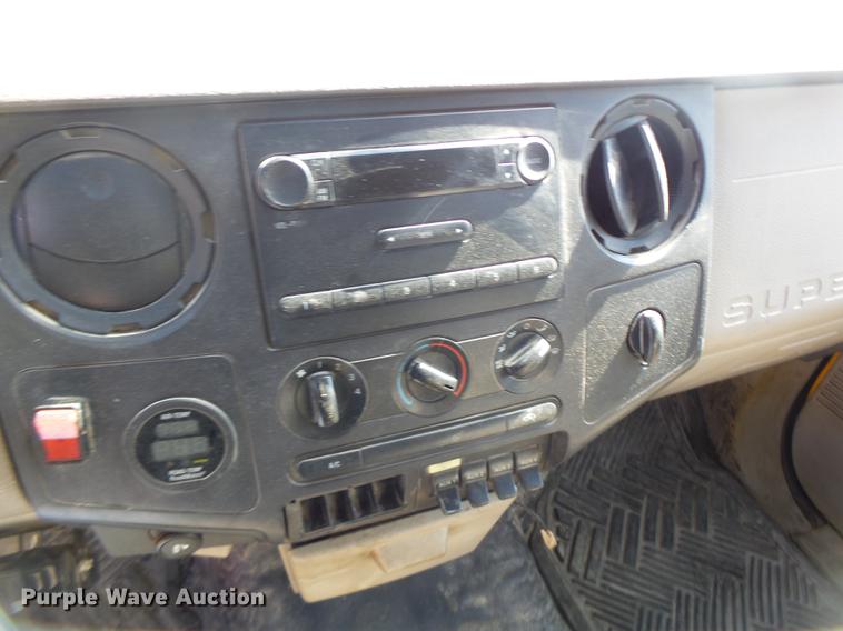 image for item DC4418 2008 Ford F550 Crew Cab flatbed dump truck