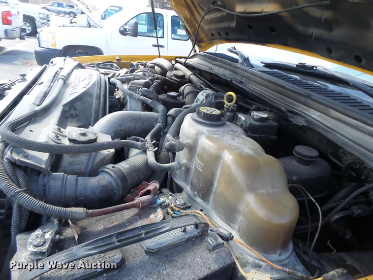 image for item DC4418 2008 Ford F550 Crew Cab flatbed dump truck