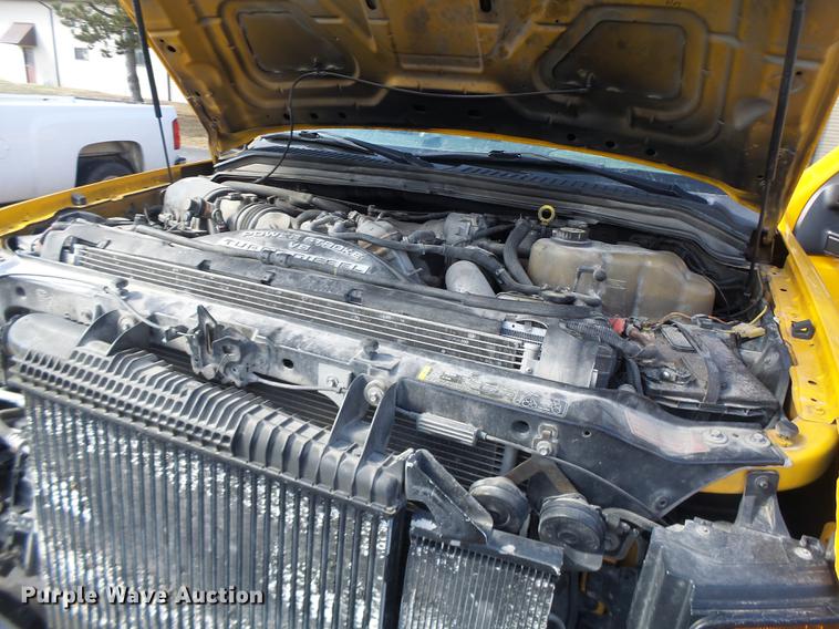 image for item DC4418 2008 Ford F550 Crew Cab flatbed dump truck