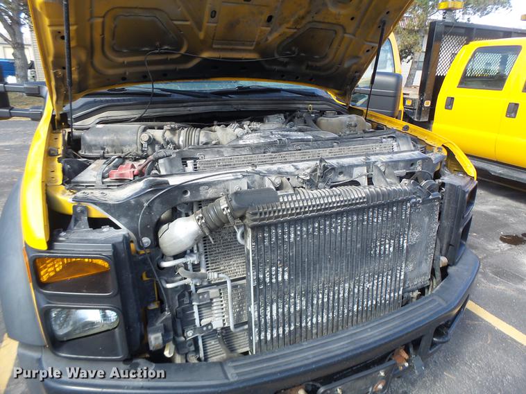 image for item DC4418 2008 Ford F550 Crew Cab flatbed dump truck